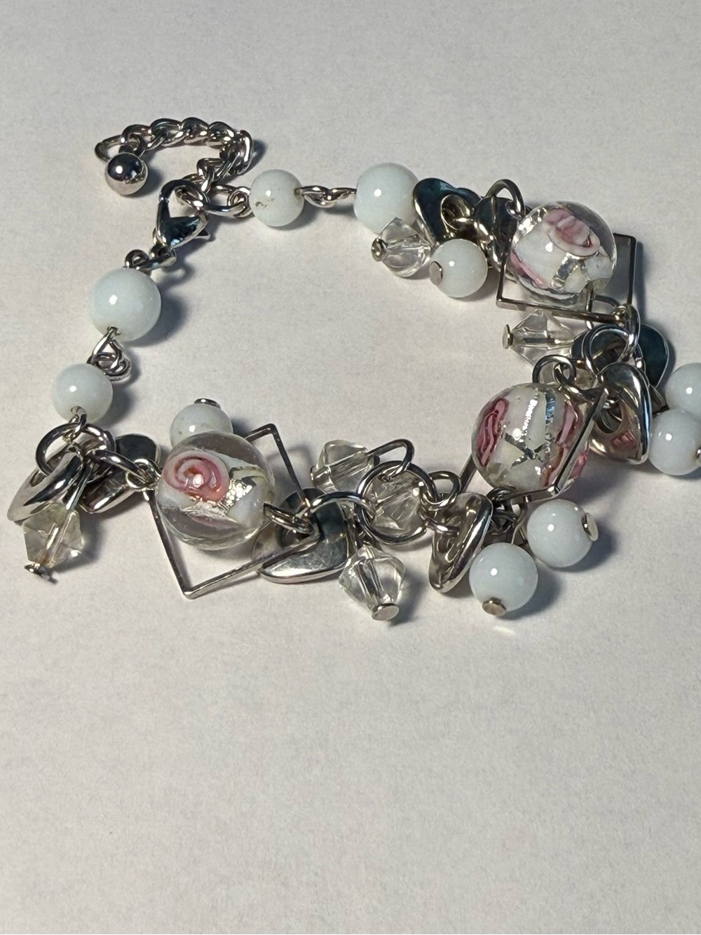 Vintage Murano Glass Flower Beads,
Silver hearts Charm bracelet. 7"
